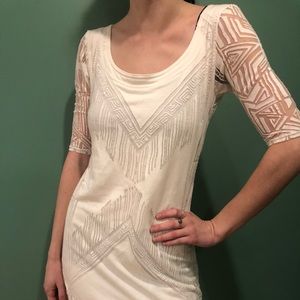 Mini dress with geometric cut outs